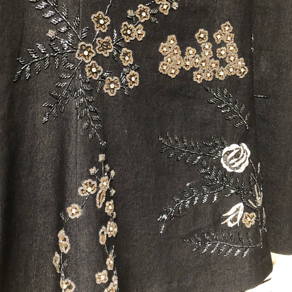Dark denim stud and embellished skirt.  A-line - Picture 8 of 12